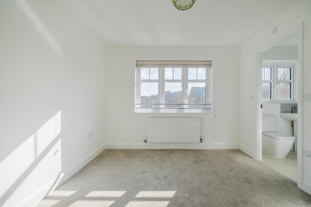 Actual photograph of bedroom 2 and its en suite entrance